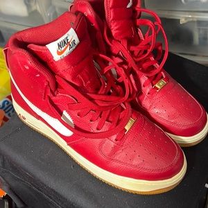Red and white high top Air Force ones